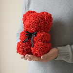 Flower bear held in arms showing size