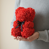 Flower bear held in arms showing size