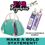 ITEM NUMBER 026134 HEAVY FABRIC PRINTED KEYCHAIN 12 PIECES PER DISPLAY WHOLESALE